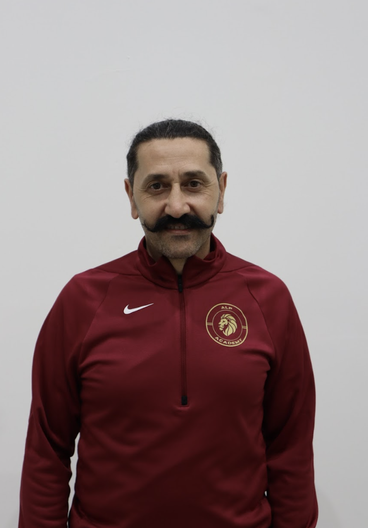 Solomon Westwood — Founder of Alp Academy, wearing academy training jacket